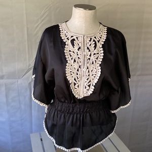 Black and cream flutter sleeve blouse